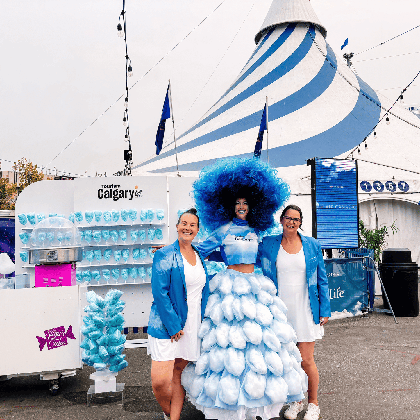 Custom blue cotton candy event activation with branded display and Cotton Candy Cart in Calgary.