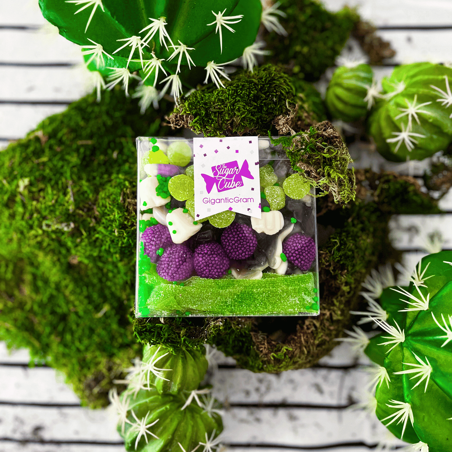 The Sugar Cube Gigantic CandyGram with sour green apple candy in a green, purple and white candy mix