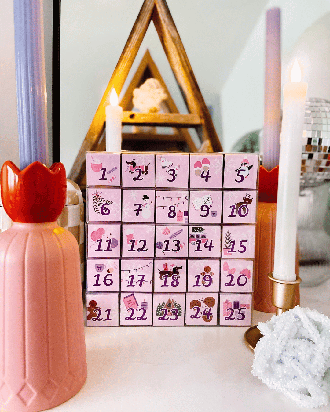 The Sugar Cube 2026 Candy Advent Calendar featuring pink holiday artwork by The Pretty Pink Studio.
