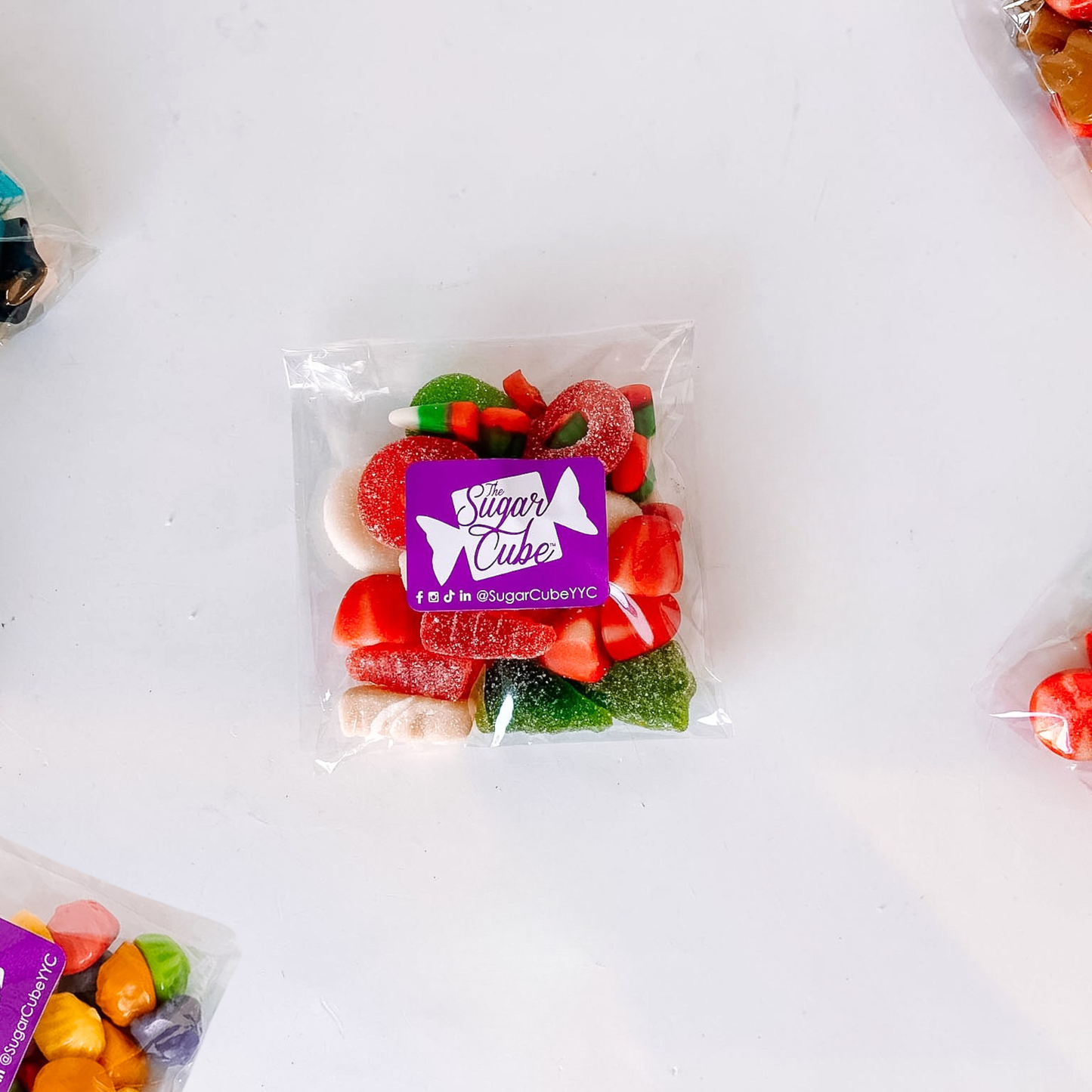 Home for the Holidays Christmas candy bag filled with festive red, green and white bulk candy