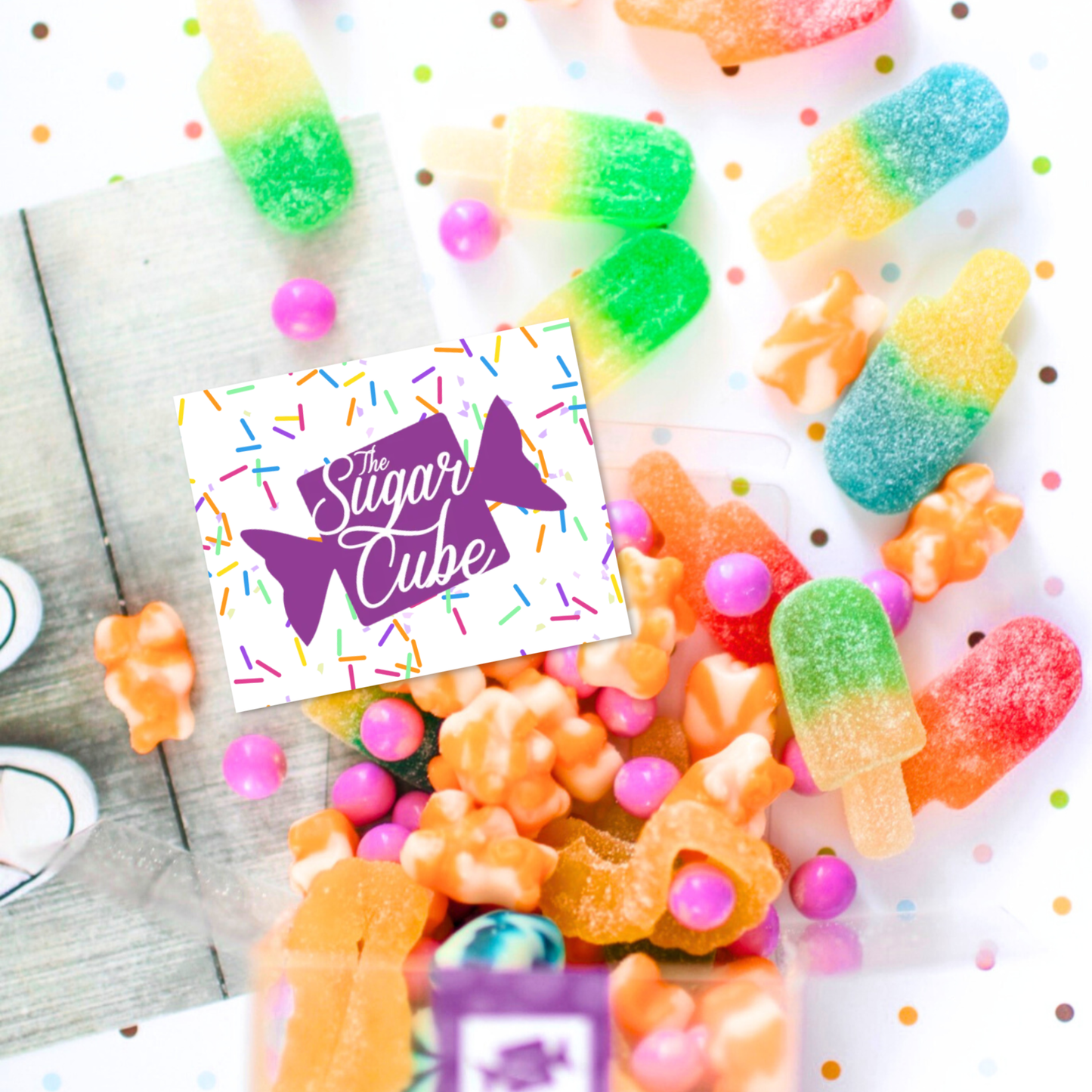 The Sugar Cube digital candy gift card displayed with a colourful assortment of gummy candy and sweets