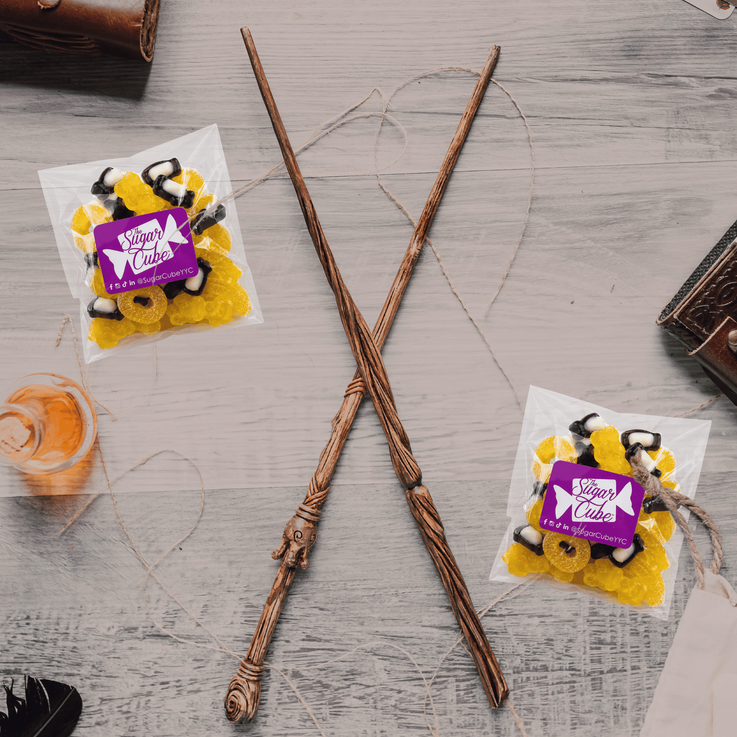 Hufflepuff Hogwarts House Candy Bag filled with yellow, black and white candy