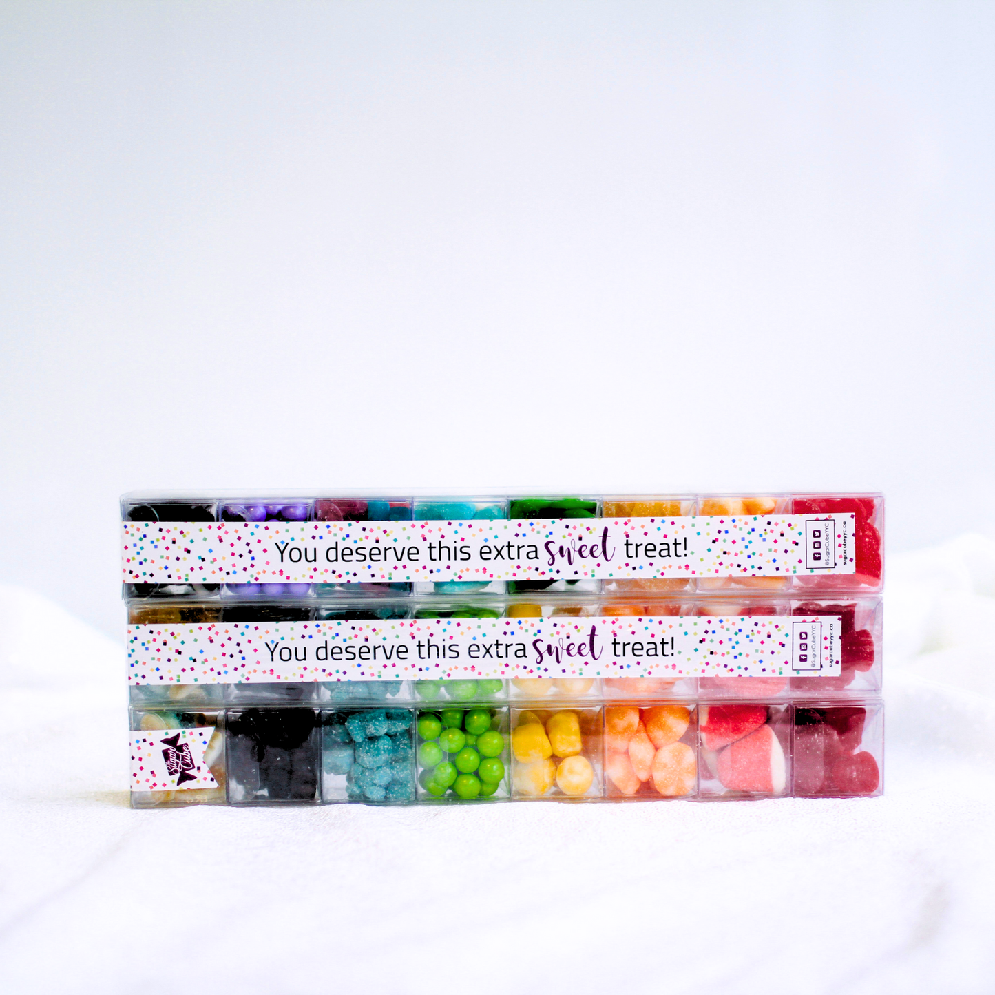 Large Christmas Sweet Stacks piled together with colourful layers of festive holiday candy