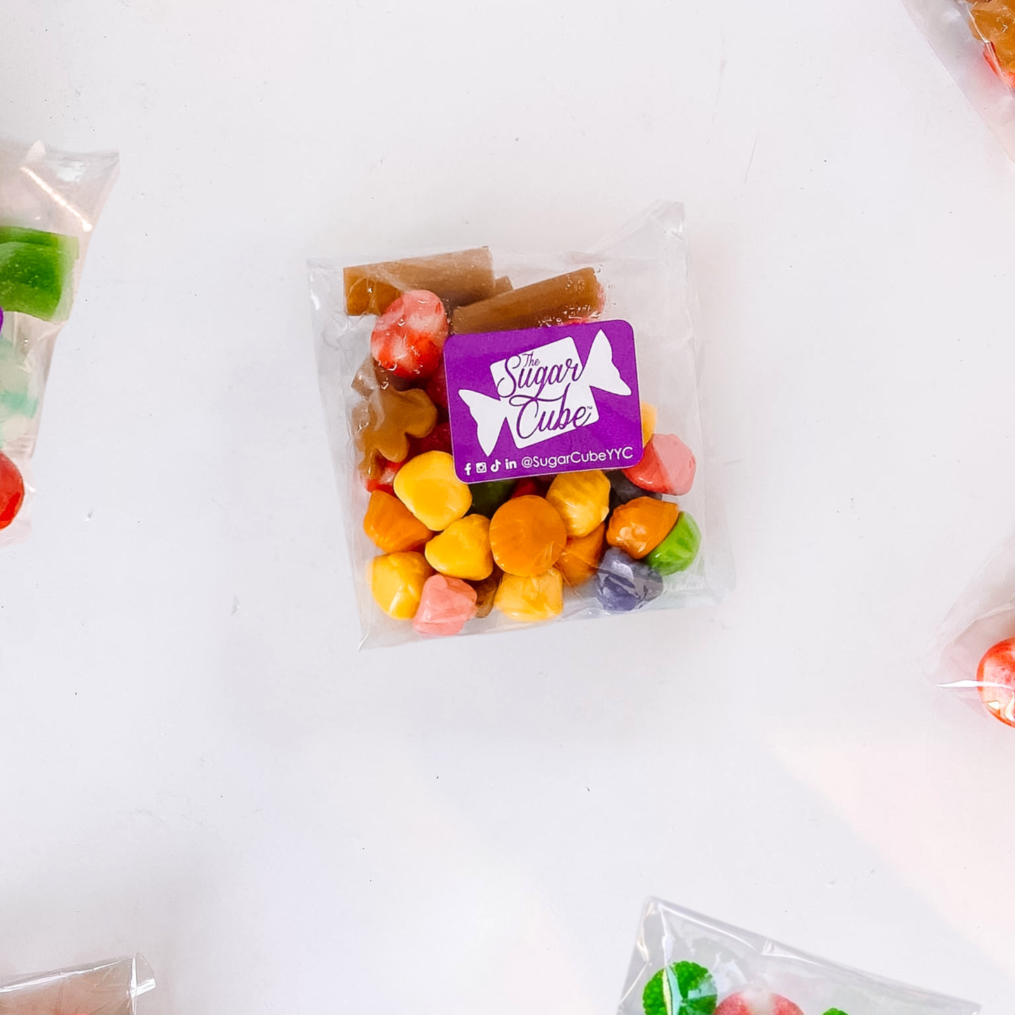 Rudolph's Stash Christmas candy bag with red and brown seasonal sweets and playful gummy carrots and gum drops