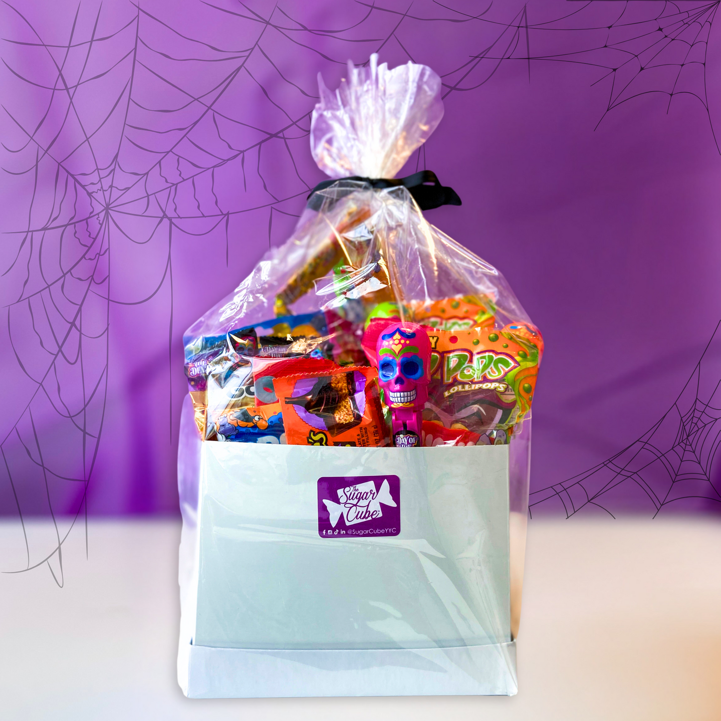 Halloween candy gift basket filled with assorted spooky sweets and novelty candy
