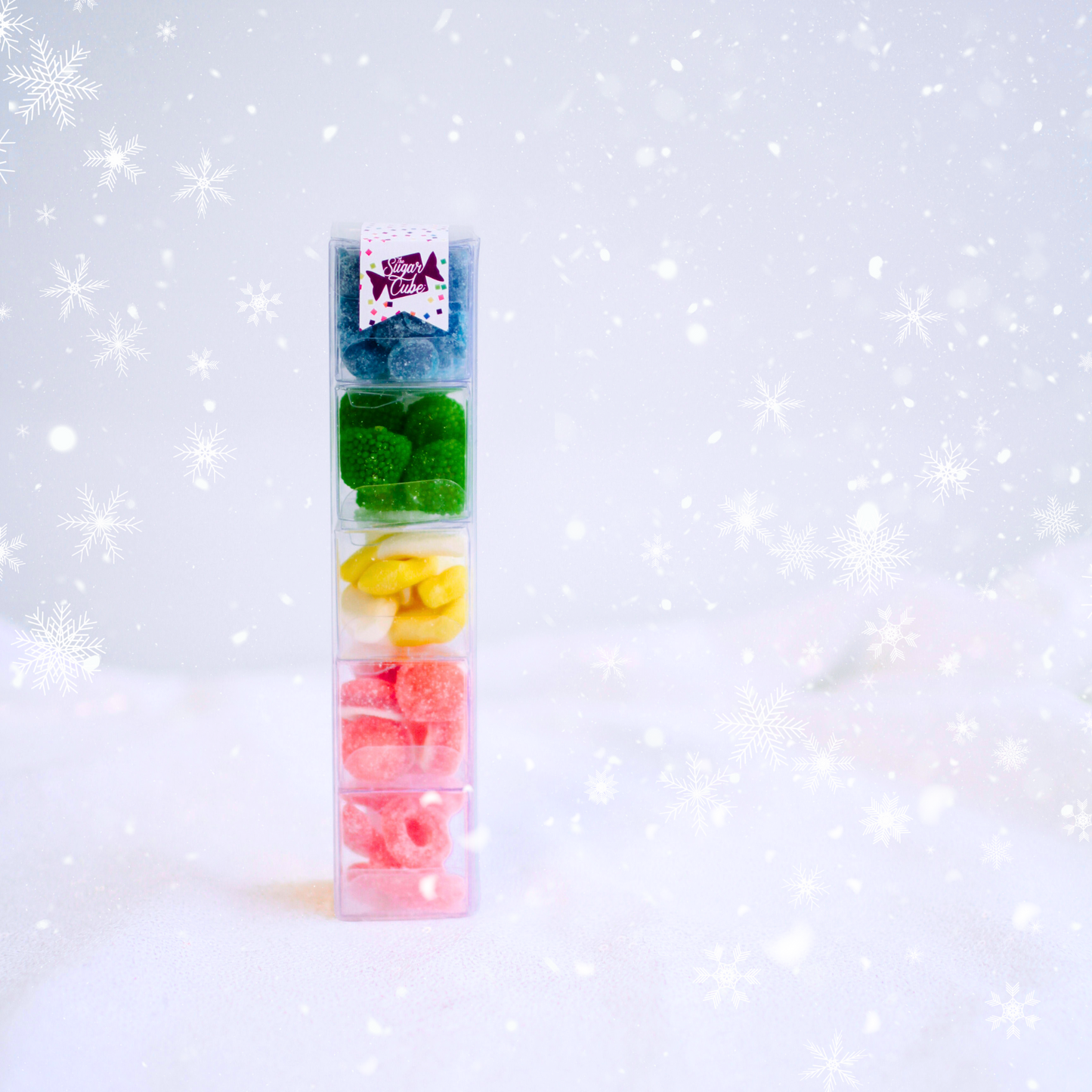 Small Christmas Sweet Stack filled with five festive candy varieties for holiday gifting and stocking stuffers